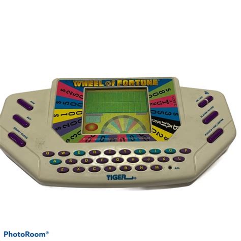 Tiger Toys Tiger Wheel Of Fortune Electronic Handheld Game Poshmark