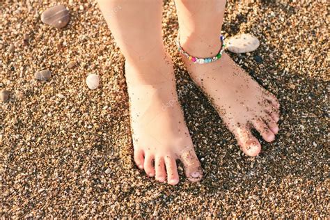 Little Girl Feet On Beach Stock Photo By ©tarafoto 57289567