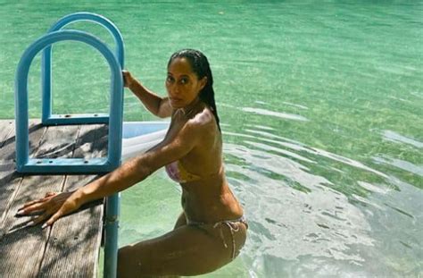 Tracee Ellis Ross Goes For A Dip In Floral String Bikini