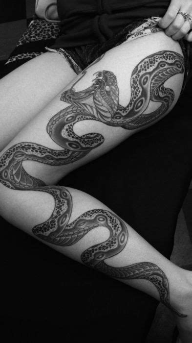 A leg tattoo of an intertwining viking snake. Image result for serpent leg tattoo | Thigh tattoos women ...