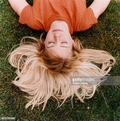 blonde girl sleeping above view photos and premium high res pictures getty images