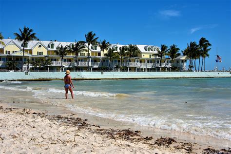 Woman Wading At South Beach In Key West Florida Encircle Photos