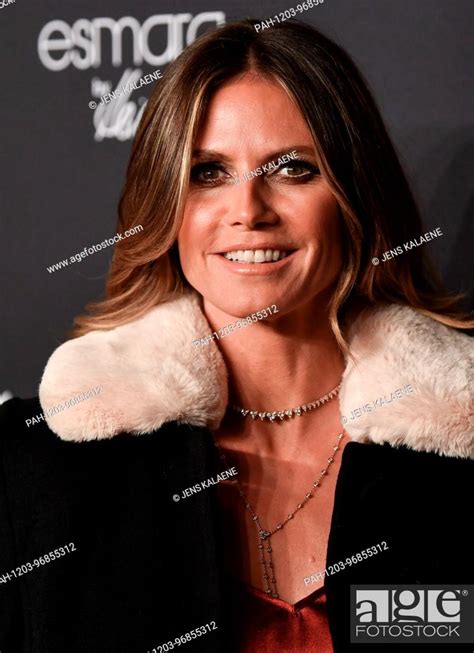 Heidi Klum Arrives In An Outfit Of Her Own Line At The Presentation Of