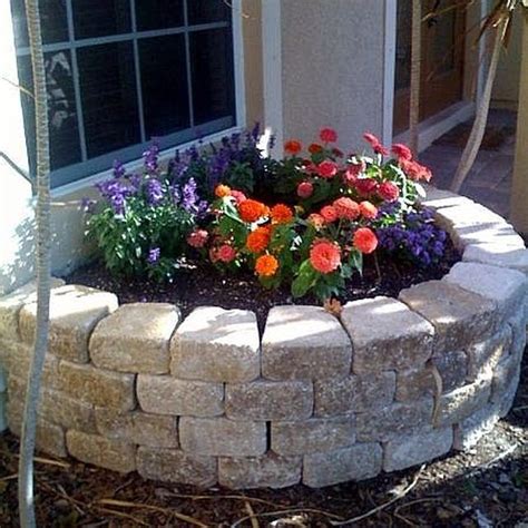 Raised garden beds also act as a great barrier for garden pests and insects. How to Build A Retaining Wall Flower Bed | Hunker | Stone ...