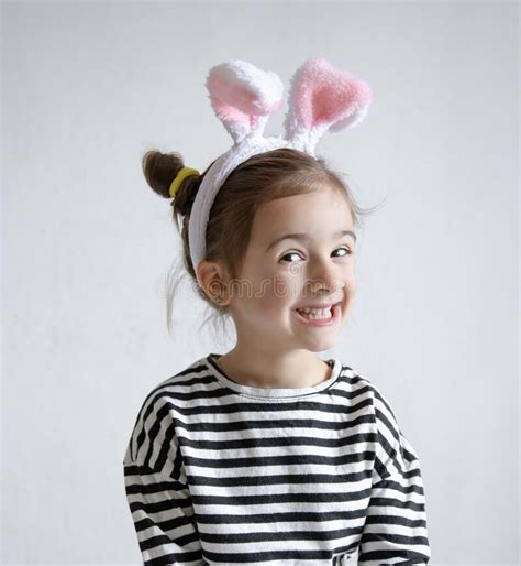 Smiling Little Girl With Decorative Easter Bunny Ears Stock Image