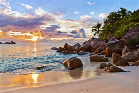 Seychelles Tropical Beach At Sunset Stock Photo By ©violin 64084341