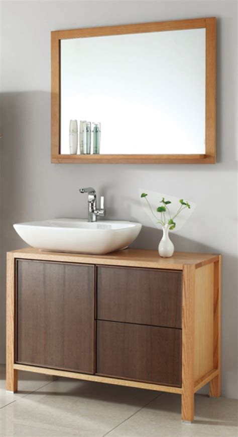 If you're designing a more compact bathroom, choose a slimline vanity unit to slot neatly beneath your small sink. 40 Inch Modern Single Sink Bath Vanity in Red Oak and Walnut
