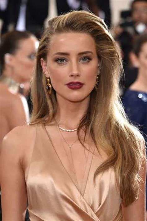 Expert Reveals If Amber Heard Can Sue Elon Musk After He Posts Pic Of Her As Mercy Without Her
