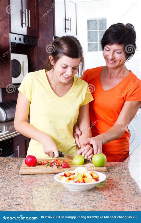 Mother Teaching Daughter Cooking Stock Images Image 23477054