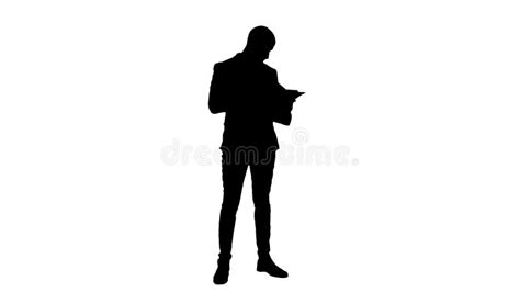Silhouette Concentrated Businessman Reading Financial Report Stock