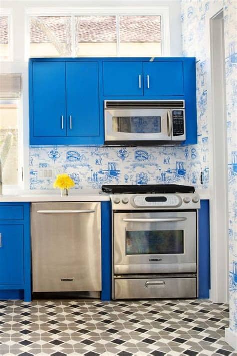 The marble backsplash is a nice contrast and makes for a good accent wall. 60 Creative Small Kitchen Ideas - Brilliant Small Space Hacks