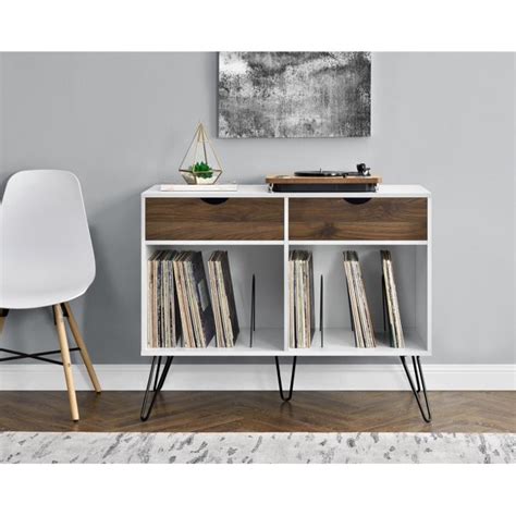 The stand is the perfect size to place your record player and keep your albums organized in the lower cubby with metal record dividers. Novogratz Concord Turntable Stand with Drawers, Multiple ...