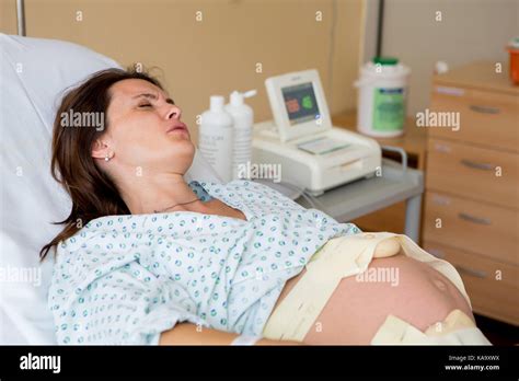Pregnant Woman In Delivery Room Having Contractions Stock Photo Alamy