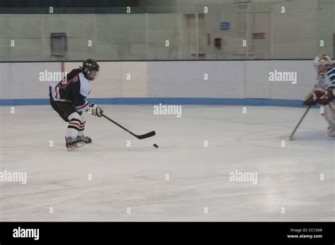 Teen Female Playing Hockey Stock Photo Alamy