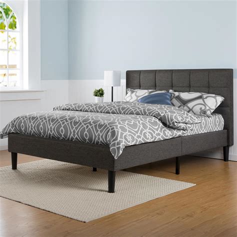 I like how the frame is also upholstered and not just the head board. Zinus Dark Grey Queen Upholstered Bed-HD-FSPB-Q - The Home Depot