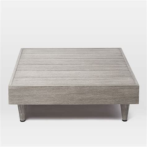 Low outdoor coffee table image and description. Portside Outdoor Low Coffee Table - Weathered Gray | west elm