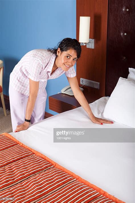 Happy Maid Cleaning The Room High Res Stock Photo Getty Images