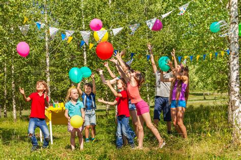 Happy Kids Having Fun Playing Balloons Outside Stock Image Colourbox