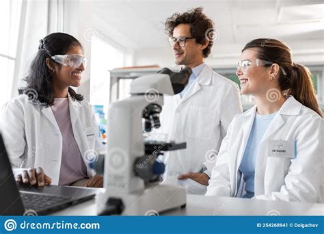 Scientists With Microscope Working In Laboratory Stock Image Image Of