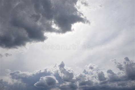 Cloud Scape With Dark Grey Rain Clouds And Copy Space Stock Photo