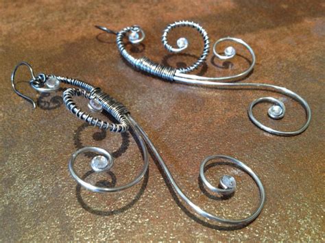 Silver Wire Wrapped Swirl Earrings Etsy Wire Wrapped Jewelry Swirl