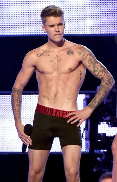 Justin Bieber S Onstage Strip Show Hottest Celebrity Shirtless Moments Of 2014 Popsugar
