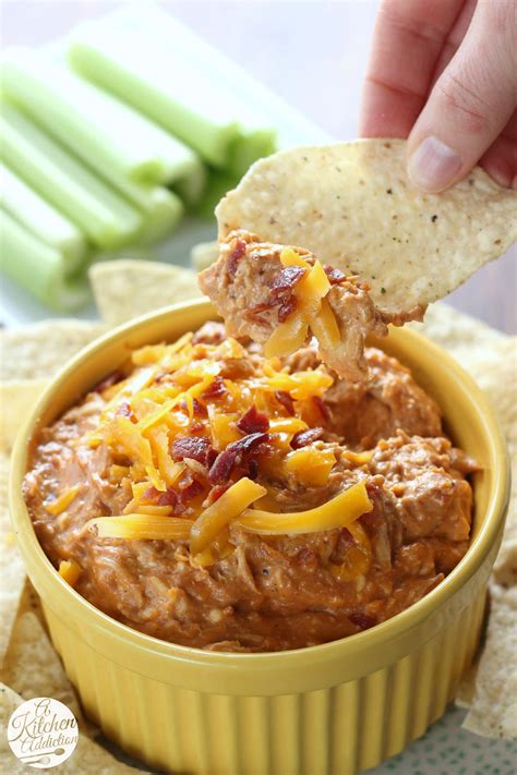 A perfect football party dip that everyone will love. Slow Cooker Barbecue Chicken Bacon Dip - A Kitchen Addiction