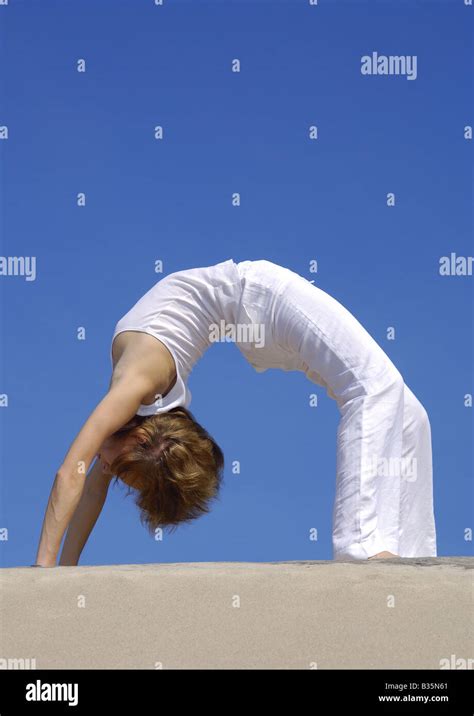 Side Profile Of A Young Woman Bending Over Backward Stock Photo Alamy