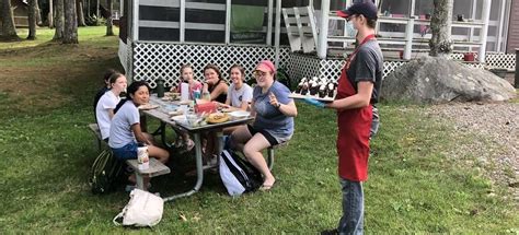 Serving Dessert At Camp Kippewa Outdoors In Summer In Maine Camp Kippewa