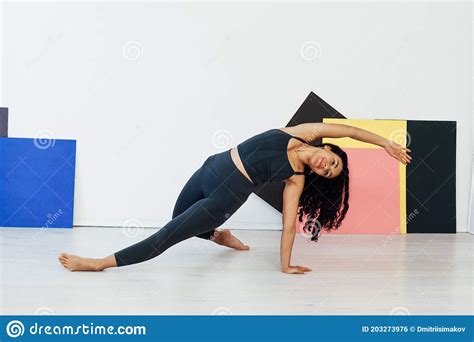 Beautiful Brunette Woman Engaged In Yoga Asana Gymnastics Fitness