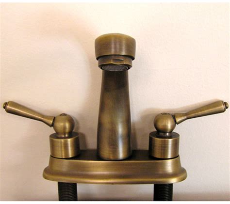 Find everything you need to complete the look of your bathroom right here at kingstonbrass.com Antique Brass Single Slot Bathroom Vanity Faucet UVLFZZ5