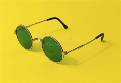 Vintage Fashionable Round Green Sunglasses On Yellow Background Stock Image Image Of