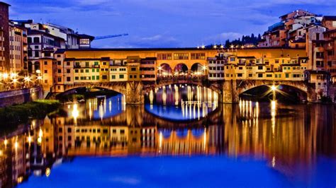 Ponte Vecchio Bridge And The Arno River At Dusk Wallpaper Backiee