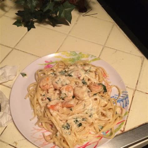 1 pound large shrimp shelled, deveined 2 tablespoon butter 2 tablespoon olive oil 4 large garlic cloves minced 1/4 cup chopped fresh italian. Shrimp Linguine Alfredo Photos - Allrecipes.com