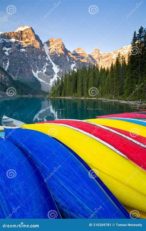 Colorful Canoes At Moraine Lake Banff National Park At Sunrise Stock