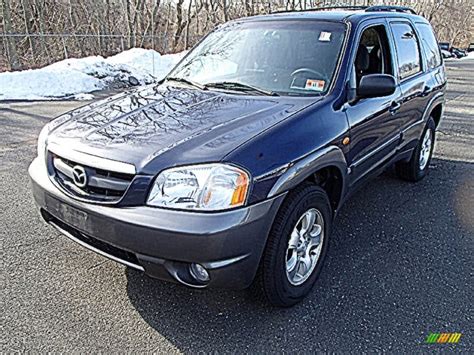 Gain insight into the 2003 tribute lx v6 4dr 4x4 from a walkaround and road test to review its drivability, comfort, power and performance. Calypso Blue Metallic 2003 Mazda Tribute LX-V6 4WD ...