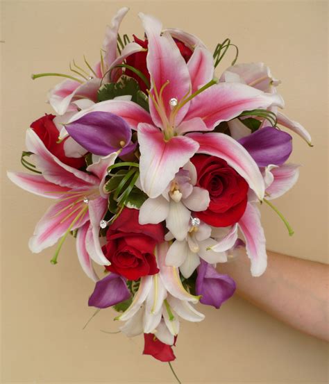 Teardrop Wedding Bouquet With Stargazer Lilies Cybmidium Orchids