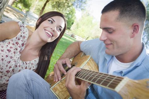 Mixed Race Couple Playing Guitar And Singing Stock Image Image Of Diversity Couple 33301059