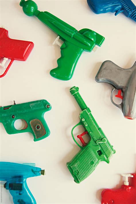 A Close Up Collection Of Vintage Toy Squirt Guns Water Pistols By