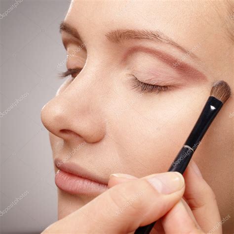 Applying Eyeshadow For Young Girl — Stock Photo © Kobyakov 4150248