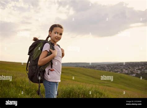 Adorable Little Girl With Backpack Standing On Mountain Top Copy Space