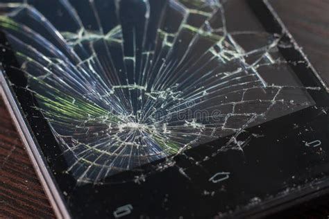 Part Of The Broken Phone Screen Cracks On Smartphone Glass Stock Photo