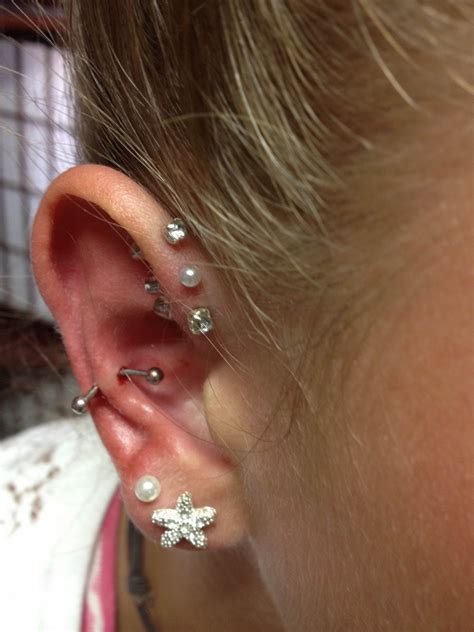 Piercing oreille cartilage innenohr piercing cartilage hoop helix piercing jewelry piercing chart double forward helix piercing heart piercing. Triple Helix Piercing ILN41 - AGBC