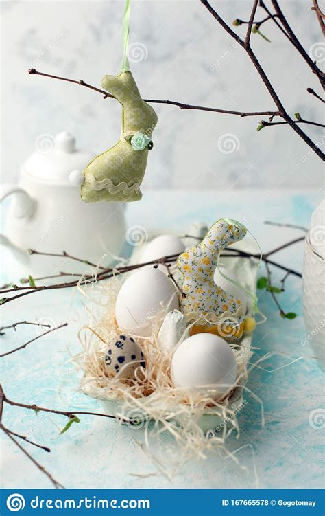 Easter Scene With Spring Fresh Greenery Branches Rabbit And Box Of