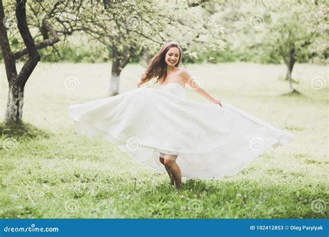 Beautiful Bride Spinning With Perfect Dress In The Park Stock Image Image Of Curly Lady