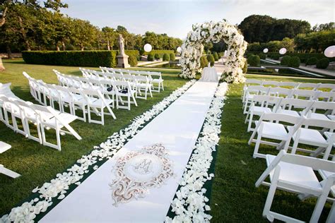 Wedding Ceremony Ideas: Flower-Covered Wedding Arch - Inside Weddings