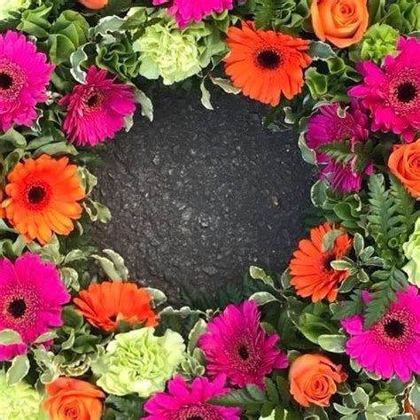 Looking for special funerals flowers? Funeral Flowers - Stunning Pink and Orange Wreath