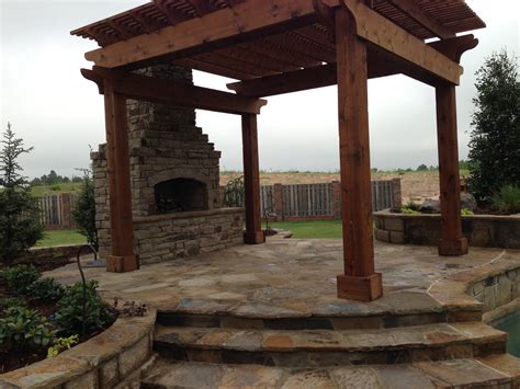 Outdoor fireplace ideas with a pergola. Custom Outdoor Fireplaces & Fire Pits in OKC | Havenscapes