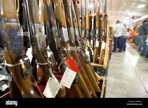 Rows of guns for sale at a gun show in Oregon Stock Photo - Alamy