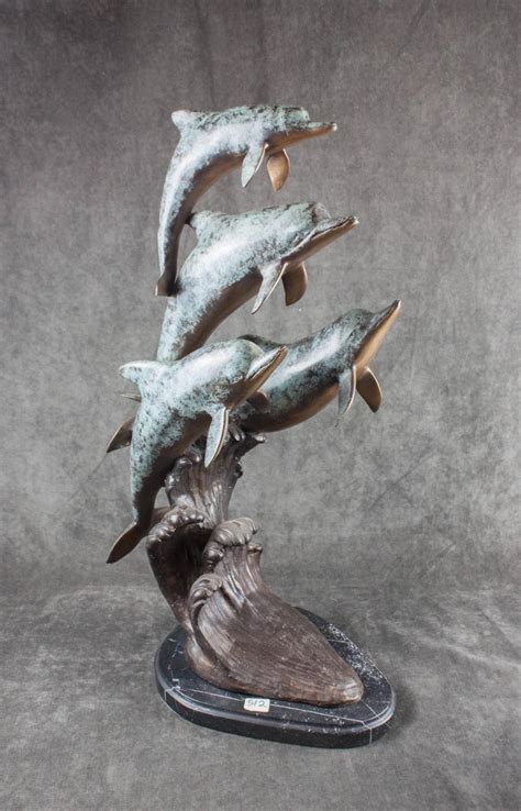 Lot Bronze Sculpture With Four Dolphins